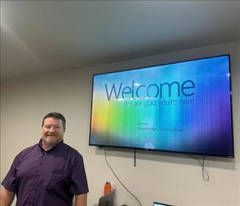 SERVPRO employee in front of screen